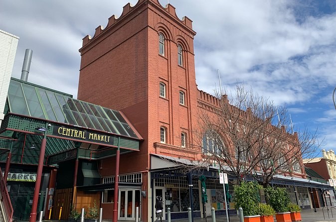 The red-brick tower and green canopy over the Central Market entrance